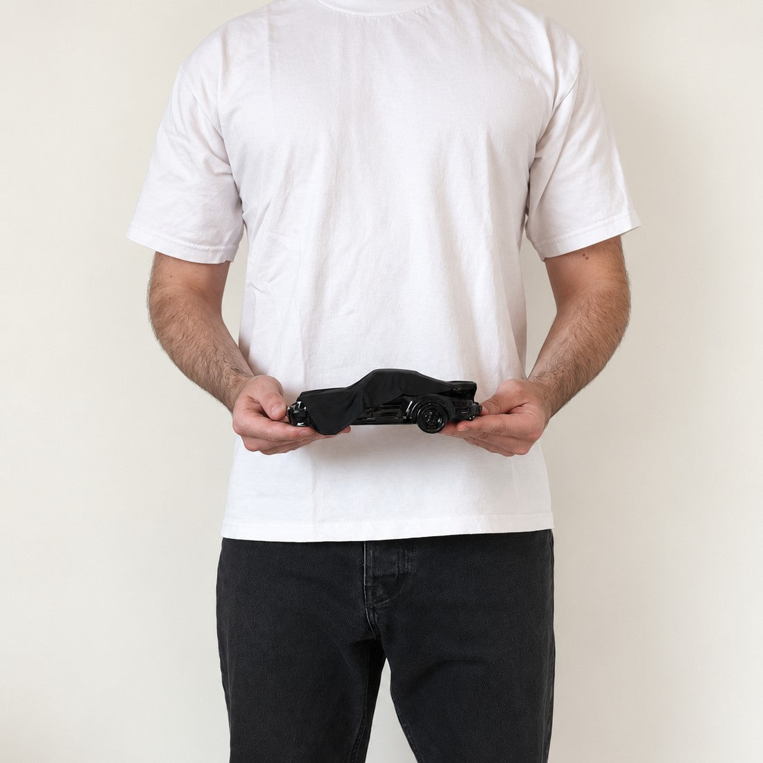 Black Memory in Medium (19 cm), held in two hands to show its real size